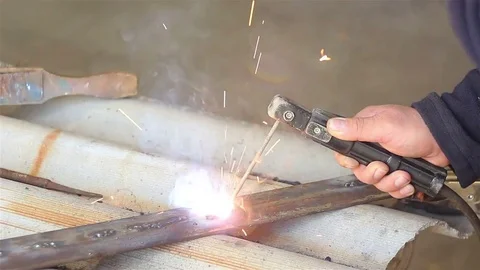 Close-up welding. Electric welder Stock Footage 77581633