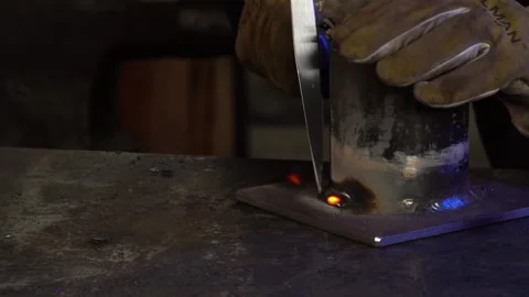 Close-Up of Welding Pick in a Workshop. Straight-On Angle. Slow Motion Stock Footage 254745193