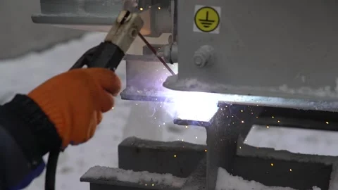 Close up of the welding process, professional worker welding pieces of steel Stock Footage 160113420