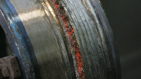 Close up of welding robots apply overlay weld protection on the pipe disks Video stock 84834005