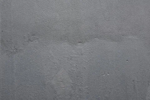 Close-up of wet concrete surface with smooth gray texture and subtle imperf.. Stock Photos