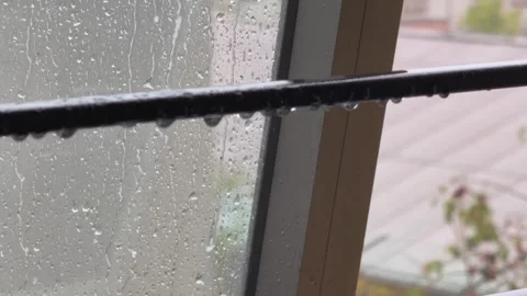 Close up of Wet Window Latch with Rain Droplets Left Open During Storm Stock Footage 344019573