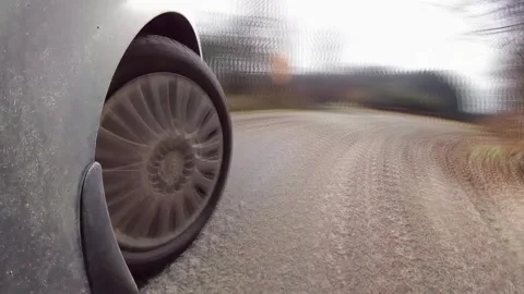 Close-Up Wheel of Car Driving Forest Road POV Time Lapse Stock Footage 133987782
