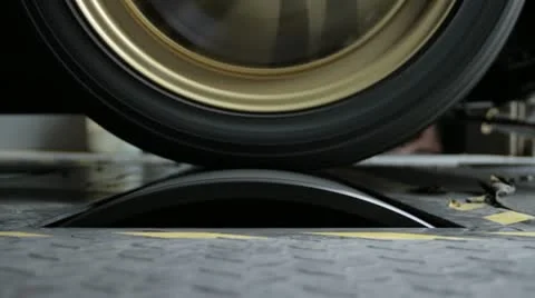 Close up of wheel on dyno test Stock Footage 12262416