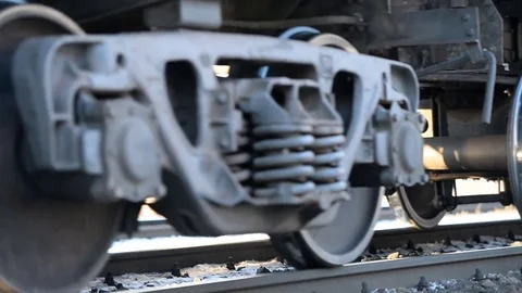 Close-up of a wheeled pair (wheeled cart) of a freight railway train Stock Footage