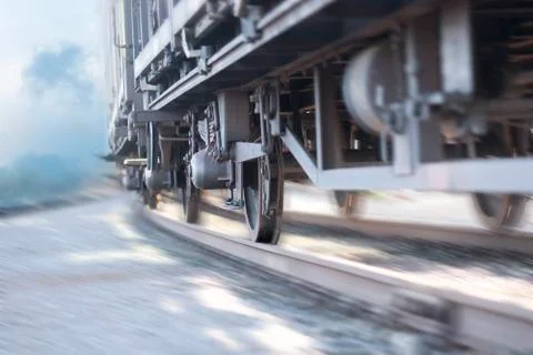 Close up of wheels of train in blurred motion Stock Photos