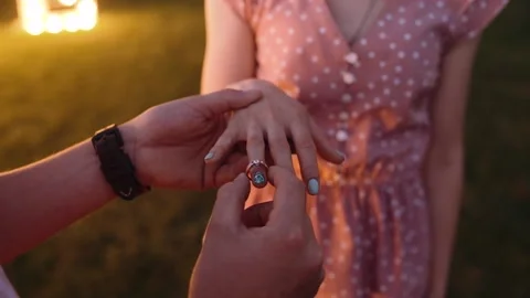 Close-up in which a young man proposes to his beloved marriage. Stock Footage 140877888