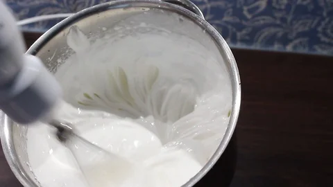 Close up of whipping egg whites Stock Footage 105427238
