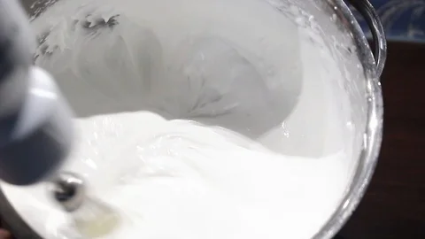 Close up of whipping egg whites Stock Footage 105427239
