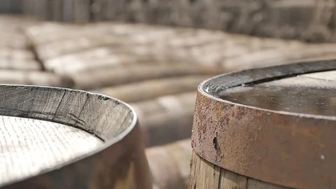 Close Up of Whiskey Barrels Outside Stock Footage 97616053
