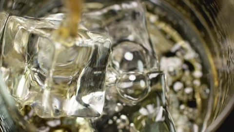 Close-up of whiskey ice cubes Stock Footage 259615076