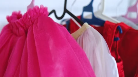 Close-up of white and red clothes hanging on a hanger Stock Footage 170706224
