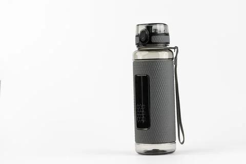 Close-up on white background stands plastic grey rubberized drinking sports Stock-Fotos