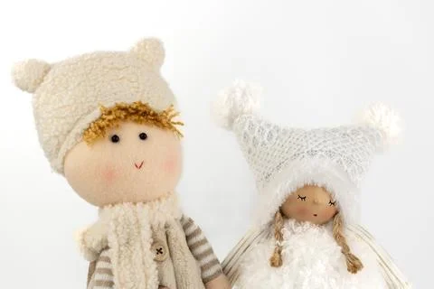 Close-up on a white background there are two toys under the Christmas tree decor Stock Photos
