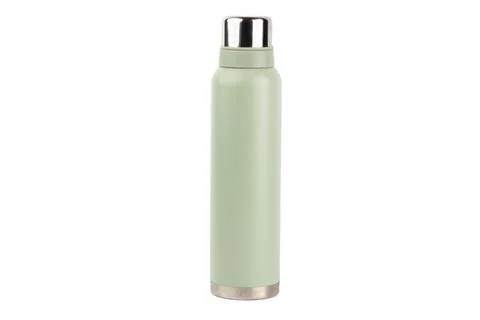 Close-up on white background there is a large thermos of soft olive color with a Stock Photos
