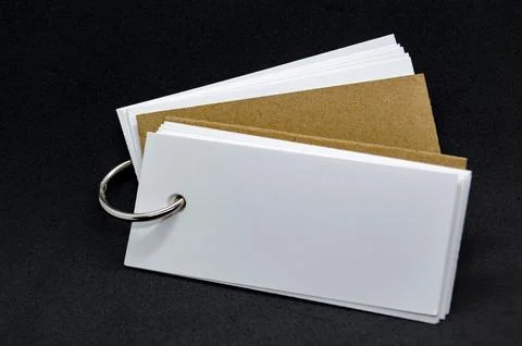 Close up of white banner shape notepad with customizable space for text on .. Stock Photos