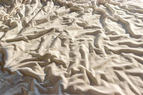 Close up white bed sheet with sunset light Stock Photos