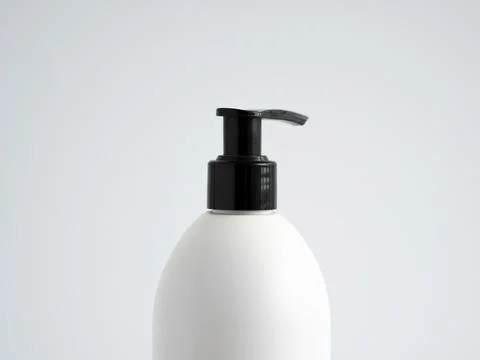 Close up white blank plastic bottle with black dispenser pump for gel, liquid Stock Photos