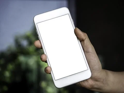 Close-up white blank screen on mobile phone. Stock Photos