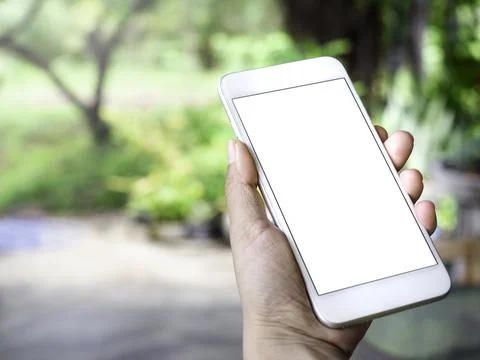 Close-up white blank screen on mobile phone. Stock Photos