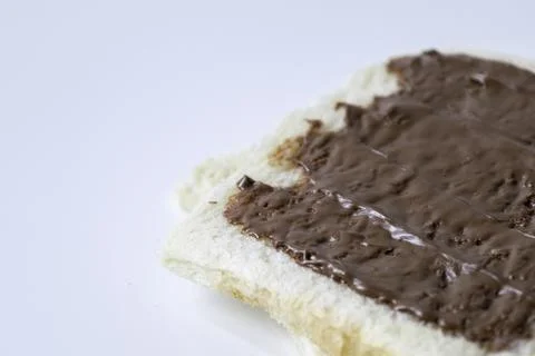 Close-up of white bread with chocolate jam Stock Photos