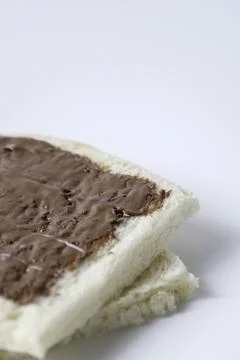Close-up of white bread with chocolate jam Stock Photos