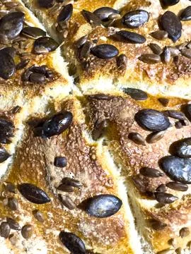 Close-up of a white bread crust showing detailed texture and cracks Stock Photos
