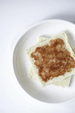 Close-up of white bread with raspberry jam Stock Photos