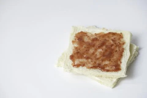 Close-up of white bread with raspberry jam Stock Photos