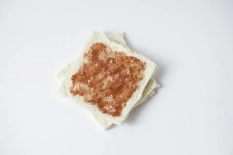 Close-up of white bread with raspberry jam Stock Photos