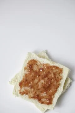 Close-up of white bread with raspberry jam Stock Photos