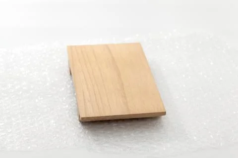 Close up of White Bubble Wrap Chopping Wood Stock Photos