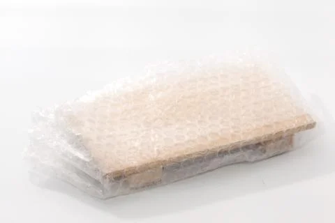 Close up of White Bubble Wrap Chopping Wood Stock Photos