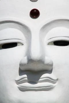 Close up of white  buddha face Stock Photos