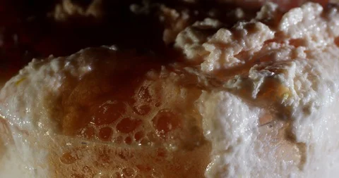 Close-up of white bursting bubbles, macro and very detailed shot of pink foam Stock-Footage 107349942