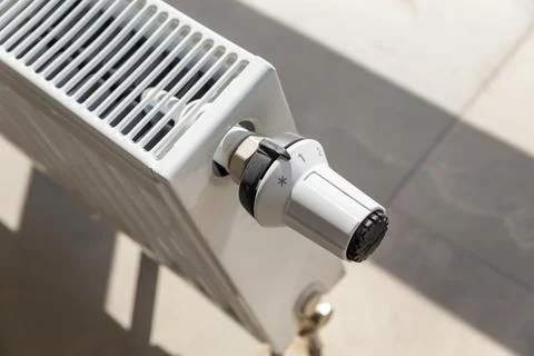 Close-up of white central heating floor radiator Stock Photos