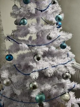 Close-up of a white Christmas tree with toys Stock Photos