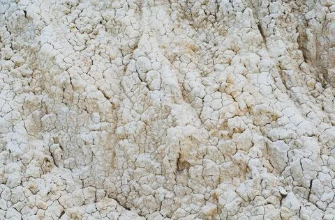Close-up white clay texture, background from light soil surface, material out Stock Photos
