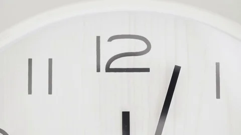 Close up white clock with big black numbers dial. Modern design Video stock 81664601
