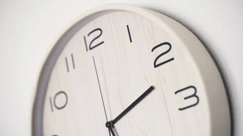 Close up white clock with big black numbers dial. Modern design Video stock 81664837