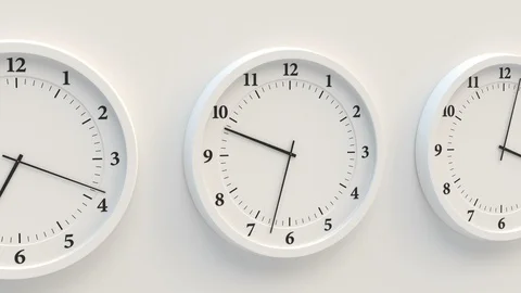 Close-up of the white clock face in a looped animation of the passage of time Stock Footage 129456281