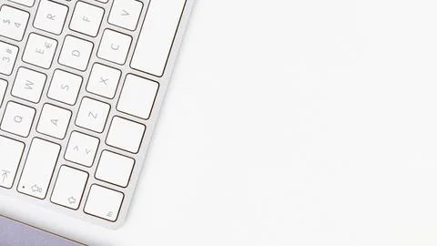 Close up of a white computer keyboard with blank keys Stock Photos