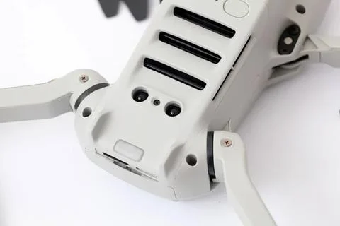 Close-up of a white drone with black propellers on a white background Stock Photos