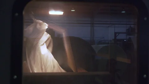 Close up of white fabric flying behind test room window, Portugal Stock Footage 128963461