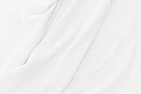 Close-up of white fabric texture background. Abstract crumpled cloth. Stock Photos