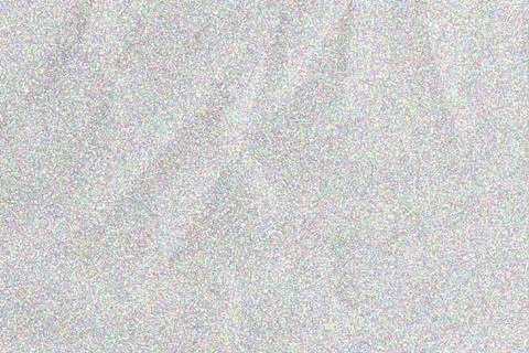 Close-up of white glitter texture with iridescent light reflections, sparkl.. Stock Photos