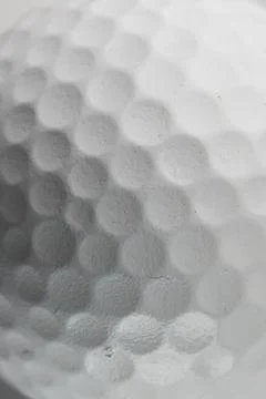 Close up of white golf ball with pattern and detail and copy space Foto stock