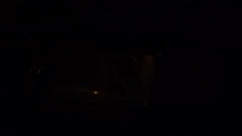 Close-up of white headlights on a car. running lights turn on at night. Vidéo 144080655