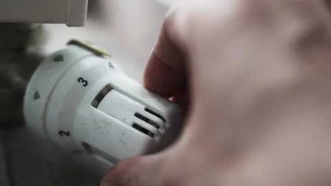Close Up of White Heating Knob on Radiator Being Turned Indoors 스톡 동영상 307178512
