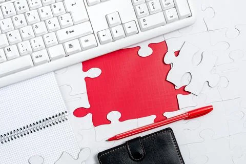 Close-Up White Jigsaw Pattern Puzzle Pieces To Be Connected With Missing Last Stock Photos